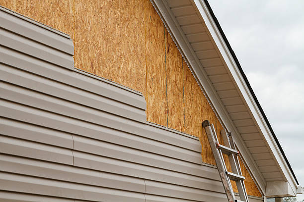 Professional Siding technician working in Duncan Falls, OH